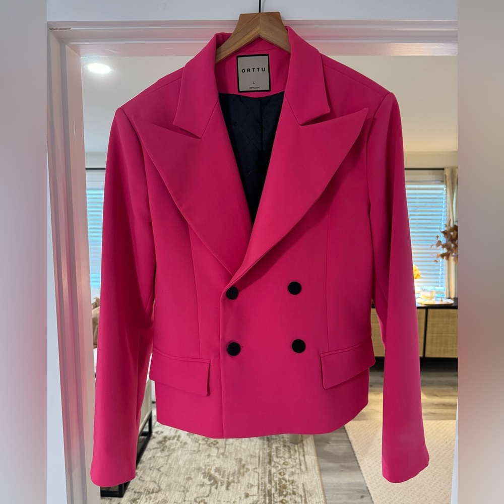 Hot pink double breasted suit. Soft and thick material. Regular fit.